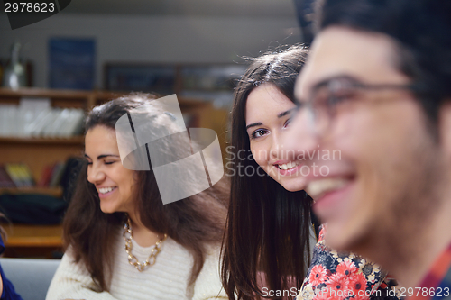 Image of happy teens group in school