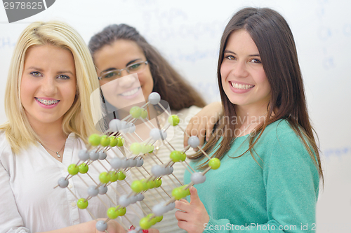 Image of happy teens group in school