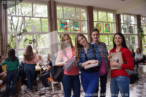 Image of happy teens group in school