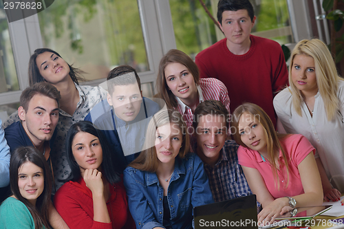 Image of happy teens group in school