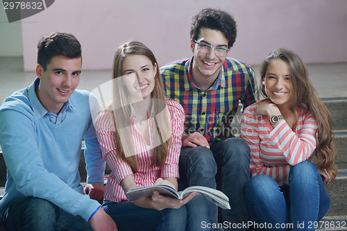 Image of happy teens group in school