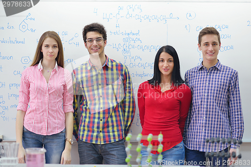 Image of happy teens group in school