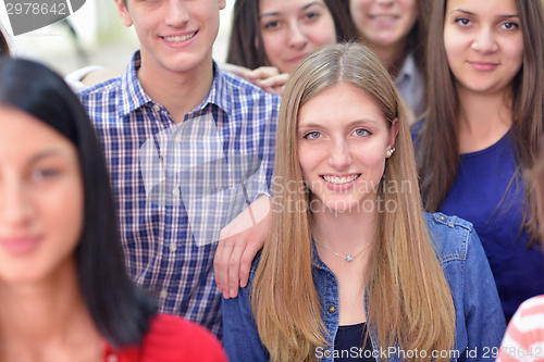 Image of happy teens group in school