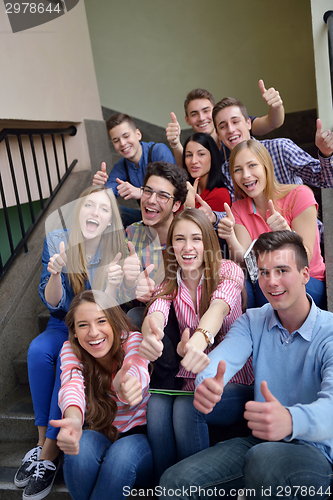 Image of happy teens group in school