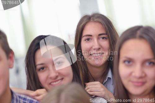 Image of happy teens group in school