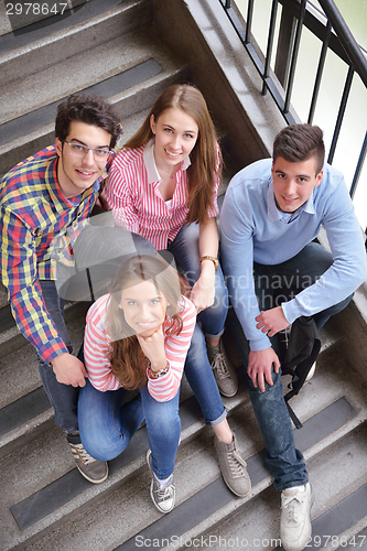 Image of happy teens group in school