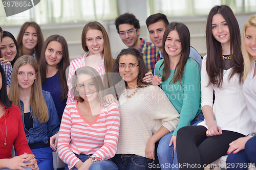 Image of happy teens group in school