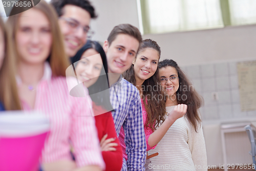 Image of happy teens group in school