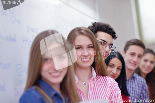 Image of happy teens group in school