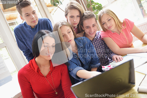 Image of happy teens group in school