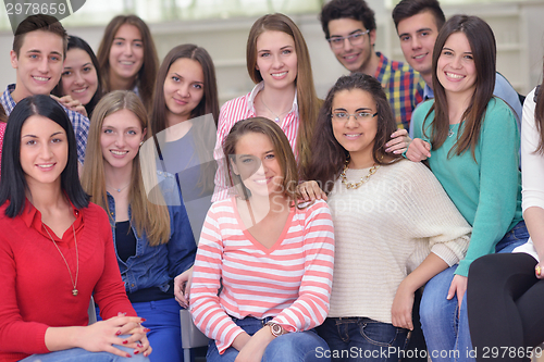 Image of happy teens group in school