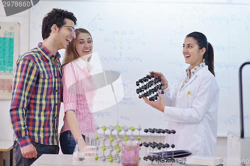 Image of happy teens group in school