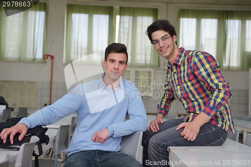 Image of happy teens group in school