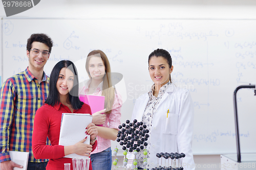 Image of happy teens group in school