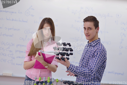 Image of happy teens group in school