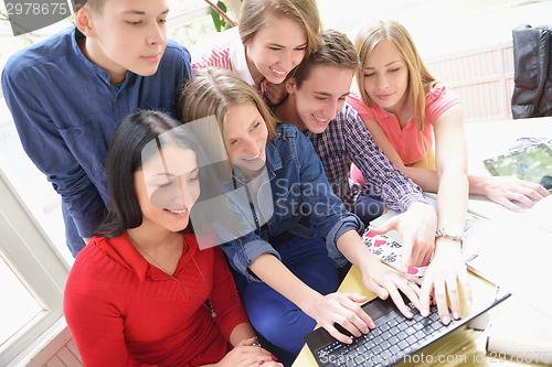 Image of happy teens group in school