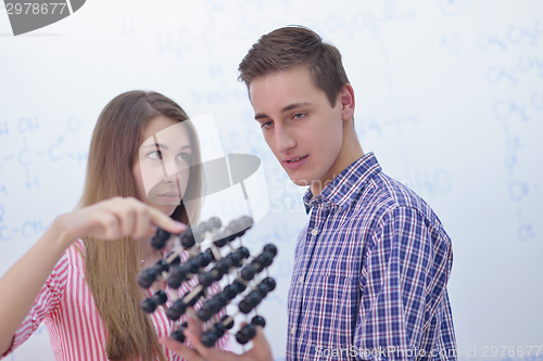 Image of happy teens group in school