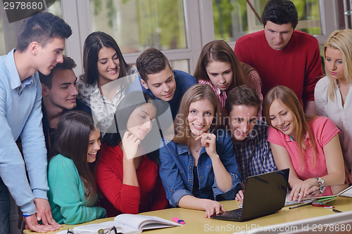 Image of happy teens group in school