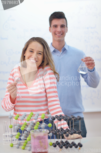 Image of happy teens group in school