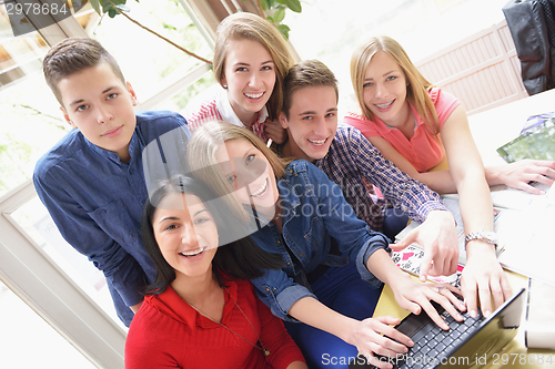 Image of happy teens group in school