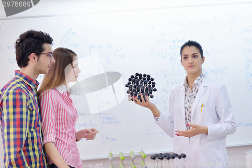Image of happy teens group in school