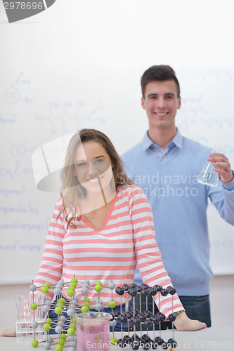 Image of happy teens group in school