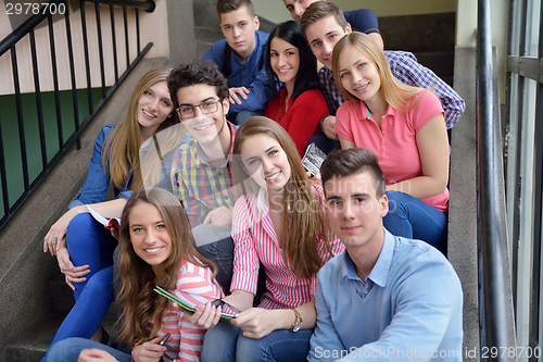 Image of happy teens group in school