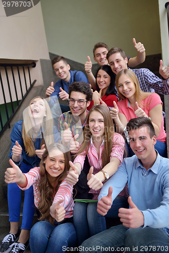 Image of happy teens group in school