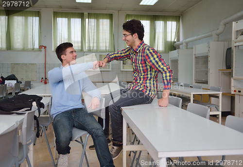 Image of happy teens group in school