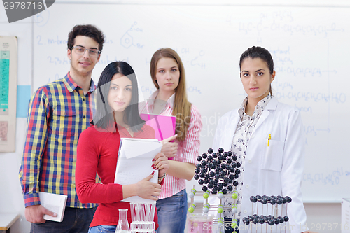 Image of happy teens group in school