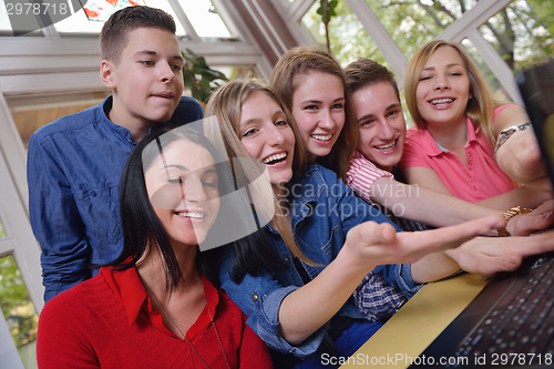 Image of happy teens group in school