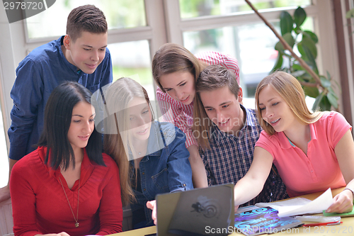 Image of happy teens group in school