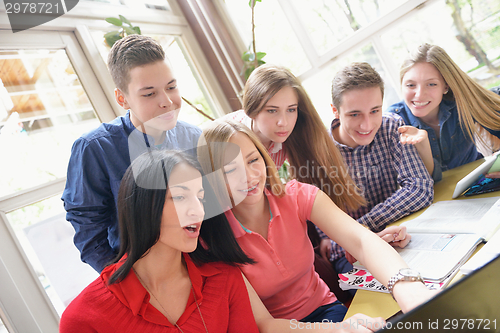 Image of happy teens group in school