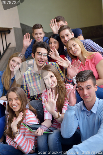 Image of happy teens group in school