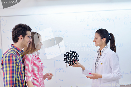 Image of happy teens group in school