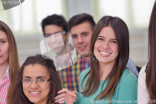 Image of happy teens group in school