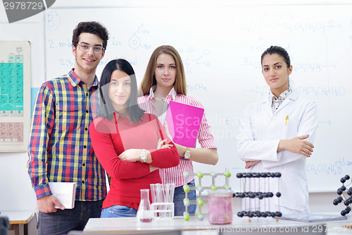 Image of happy teens group in school