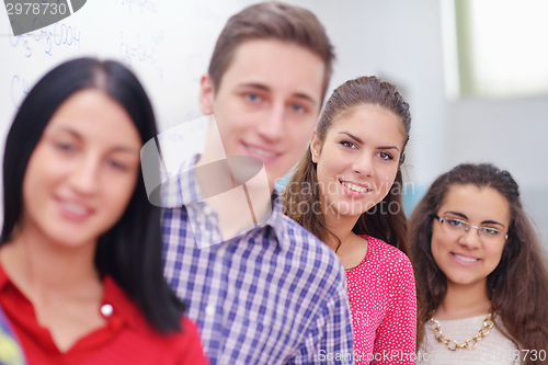 Image of happy teens group in school