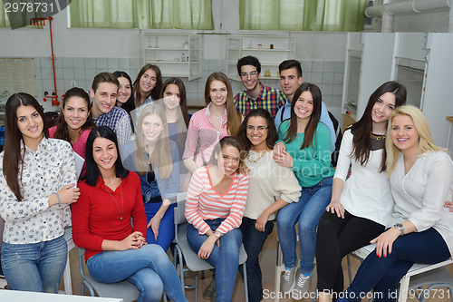 Image of happy teens group in school