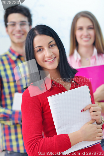 Image of happy teens group in school