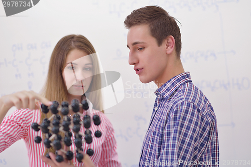 Image of happy teens group in school