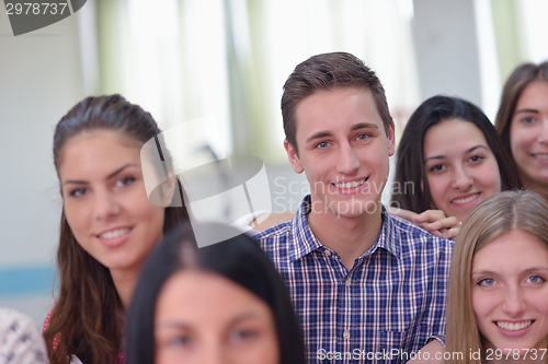 Image of happy teens group in school