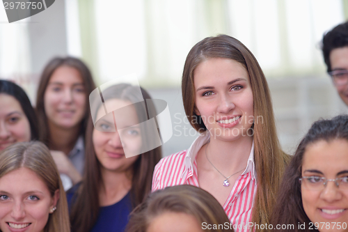 Image of happy teens group in school