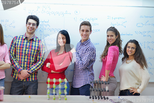 Image of happy teens group in school
