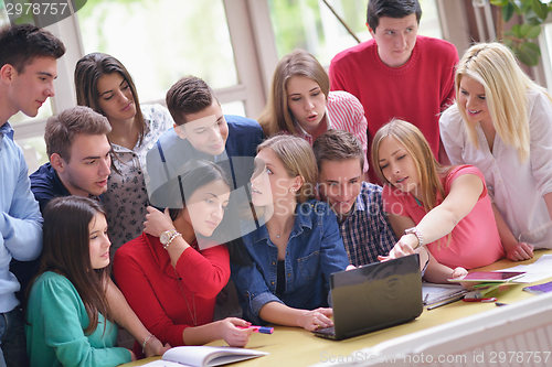 Image of happy teens group in school