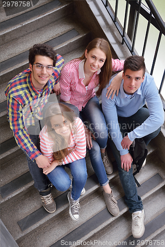 Image of happy teens group in school