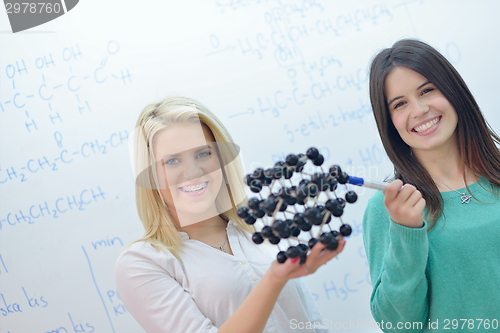 Image of happy teens group in school