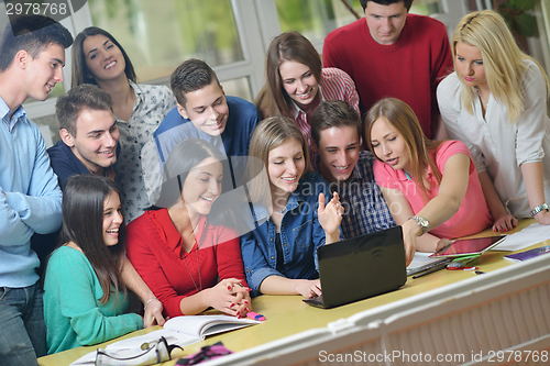 Image of happy teens group in school