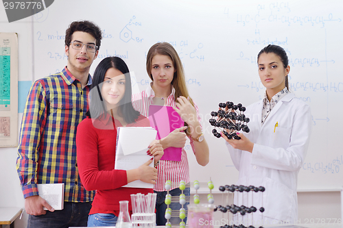 Image of happy teens group in school