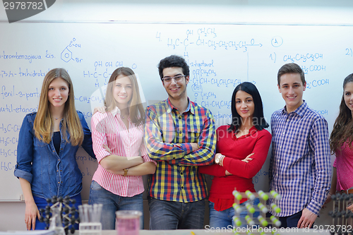 Image of happy teens group in school